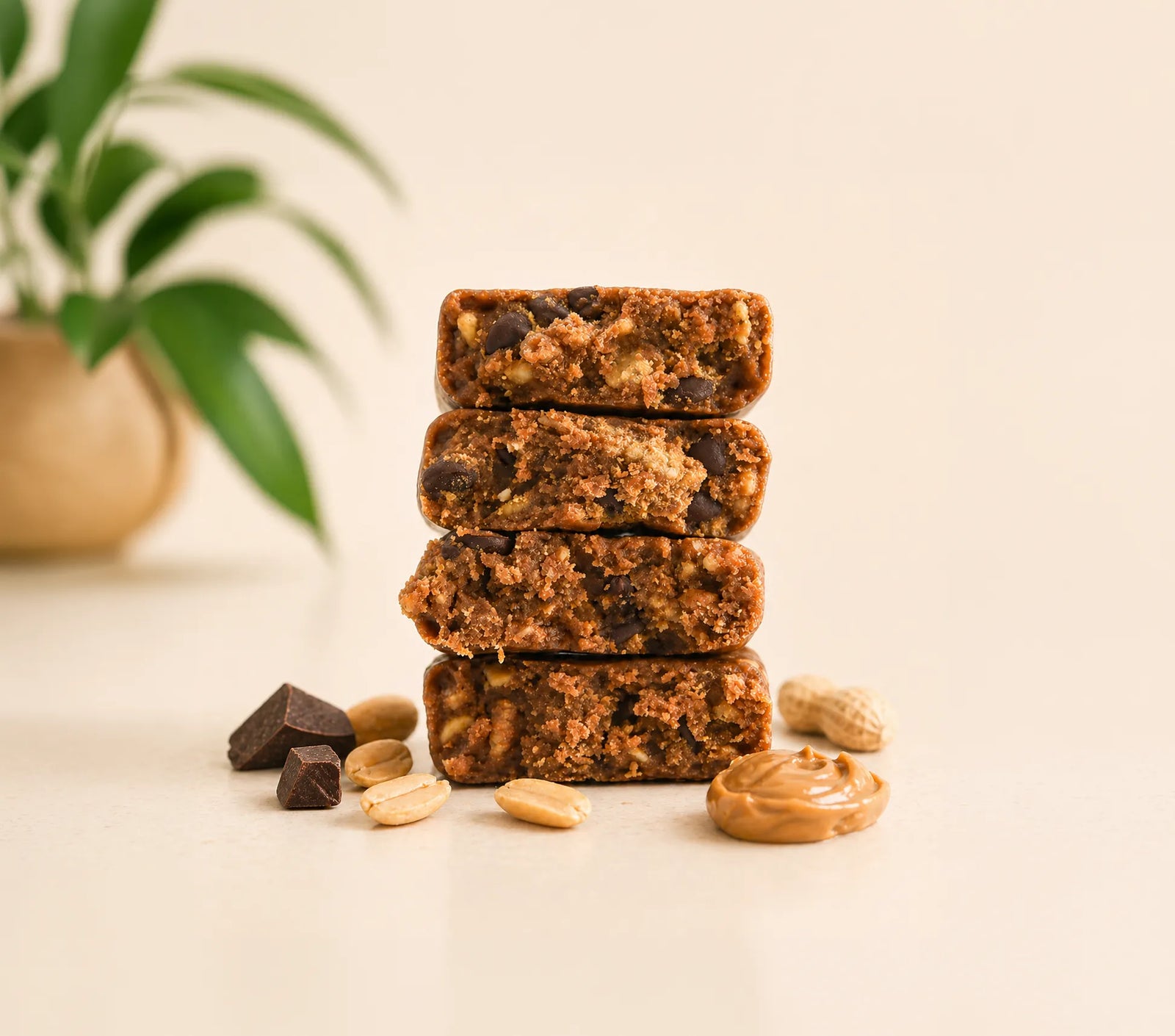 Stacked Peanut Butter Chocolate Chip Zing Bars showing soft texture with peanuts, peanut butter, and dark chocolate chips
